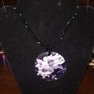 Beaded multi strand necklace with painted shell